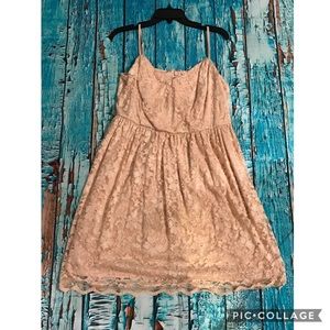 Cream lace knee length dress.